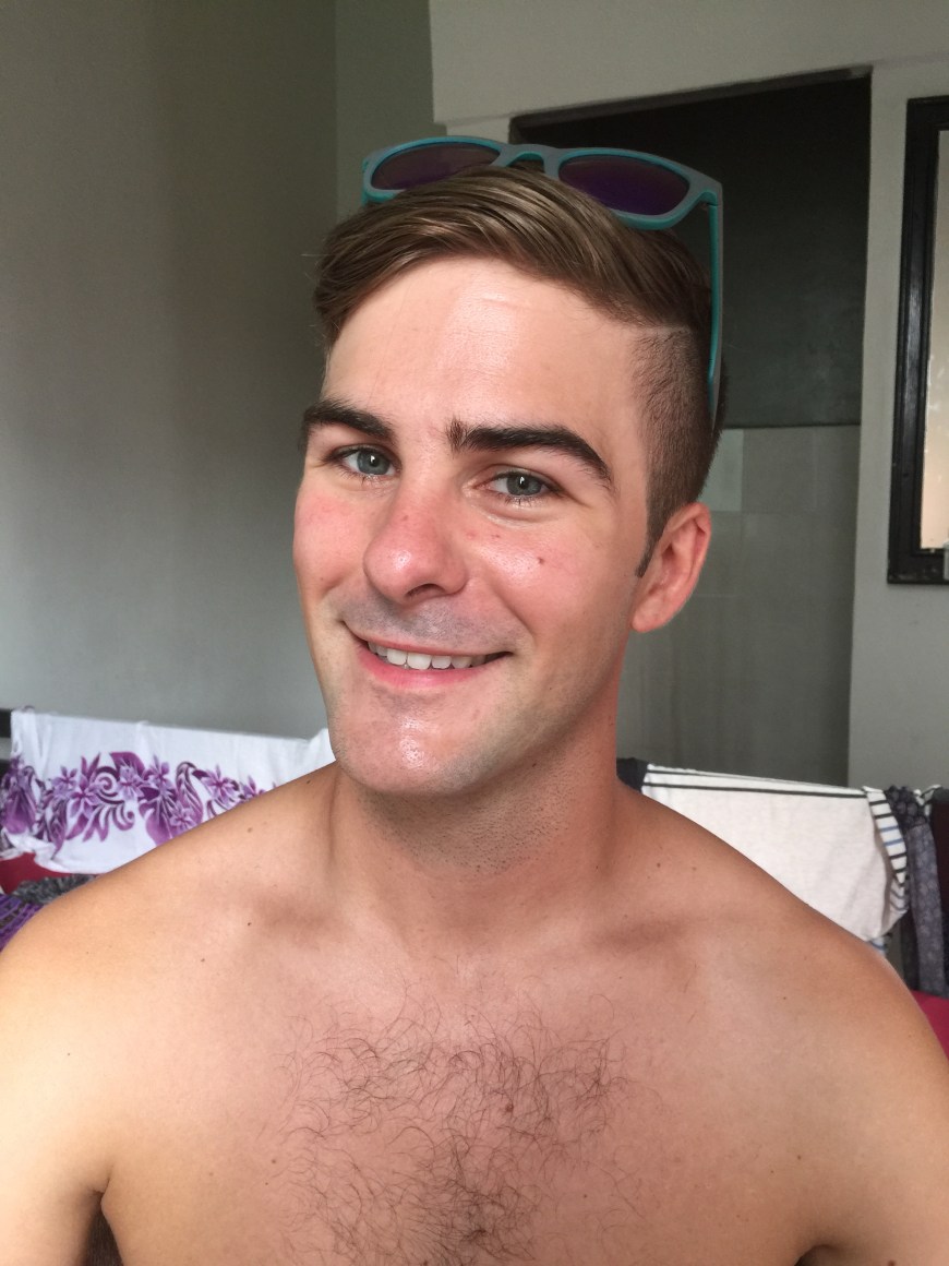 After getting a haircut and shave in Kaula Lumpur, Malaysia