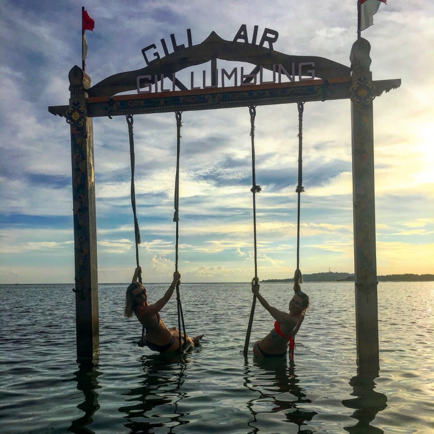 Swinging on the insta-famous swings over the ocean on Gili Air