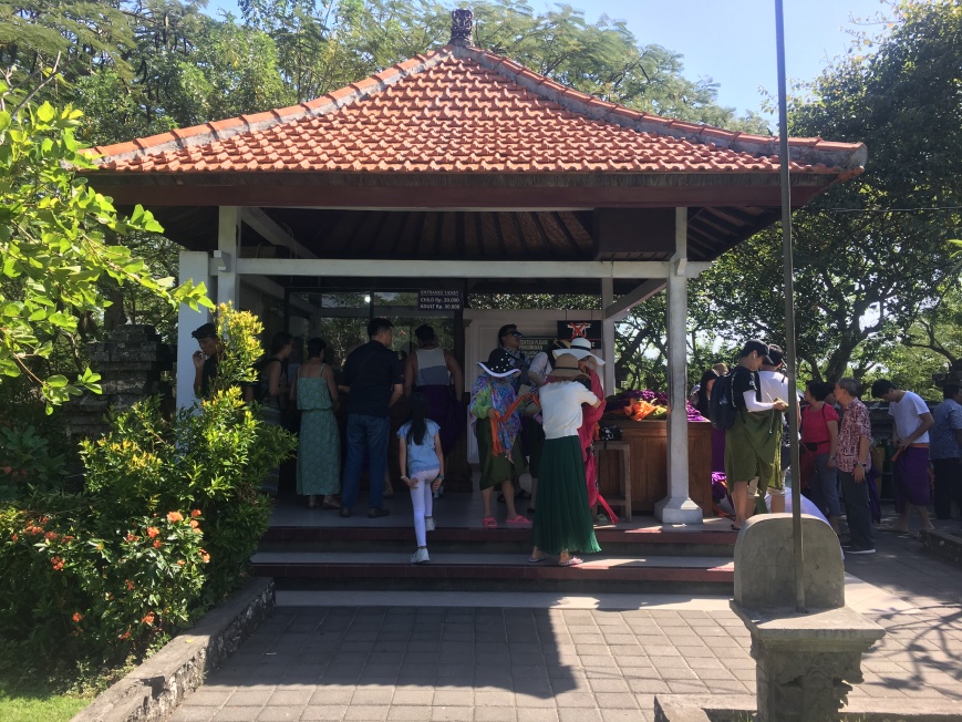 Ticket Counter And Sarong Station At Uluwatu Temple Where Sarongs Are Included In Entrance Fee