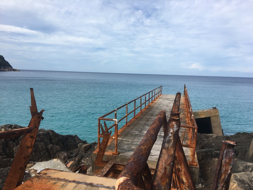 Flat part of the dock before the log ladder into the blue lagoon