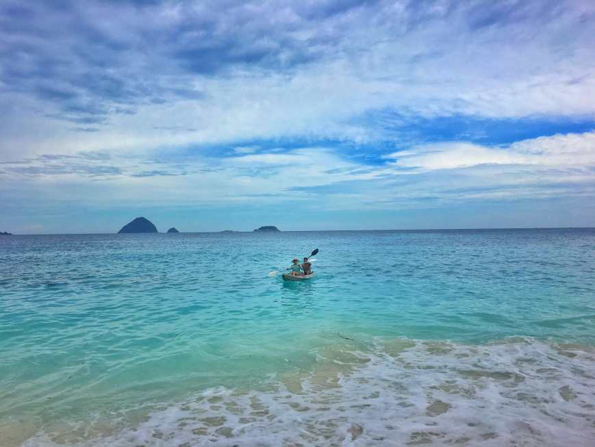Paddling into shore to explore the next beach on Perhentian Kecil