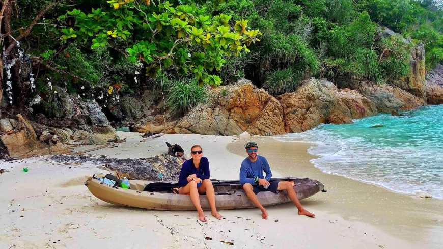Alli and TJ sitting on our kayak and marveling at the beauty around us