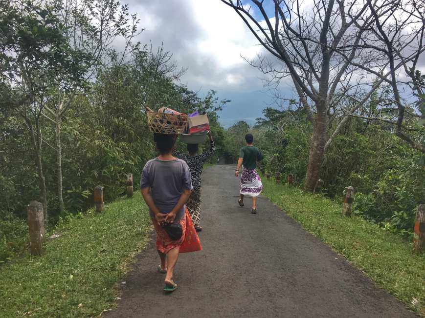 Passing a Couple Of Local Women Carrying Offerings On Their Head On Our Way Back Down The Mountain
