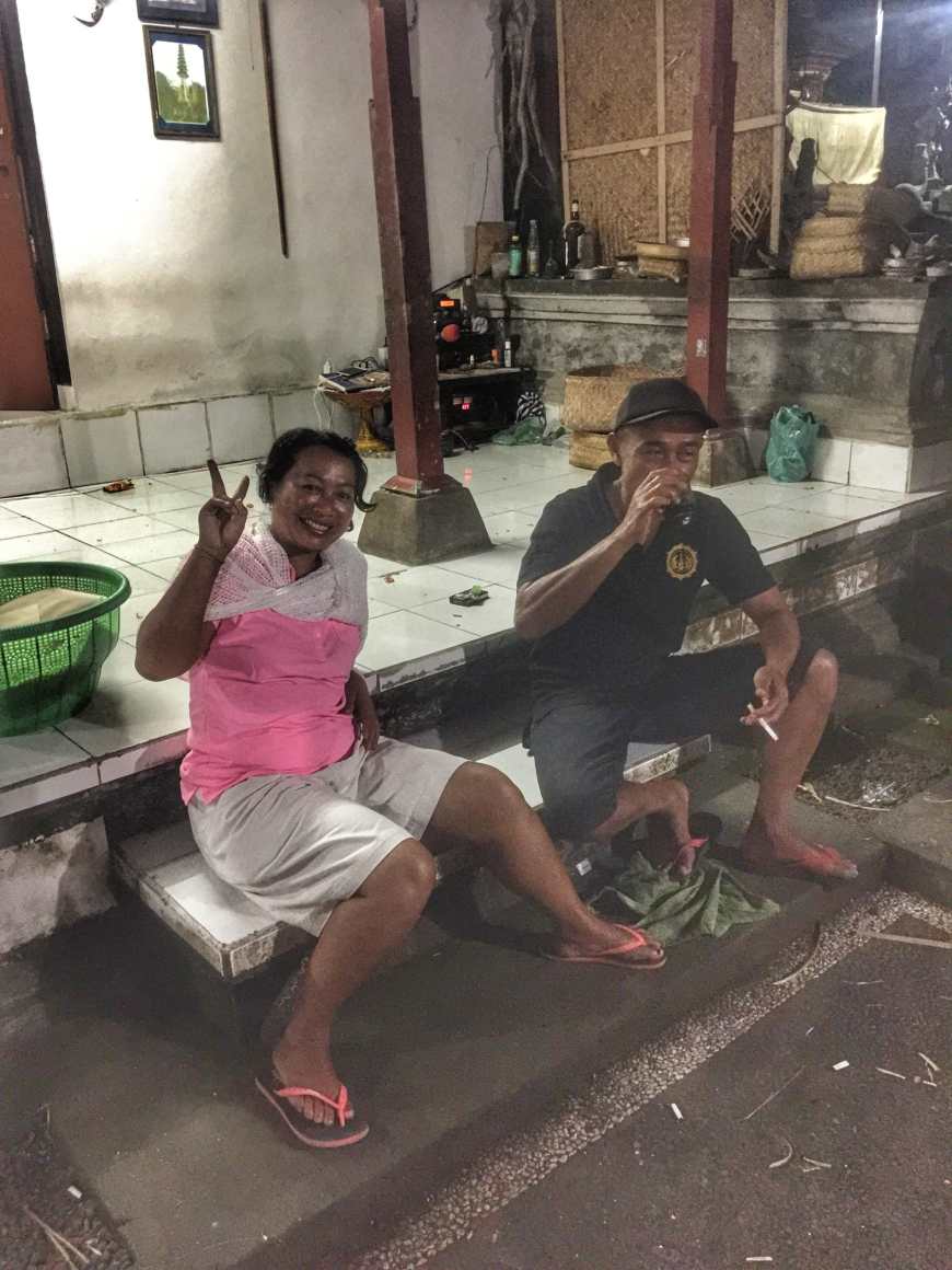 Cooking dinner and drinking with a group of 30 Balinese locals and friends