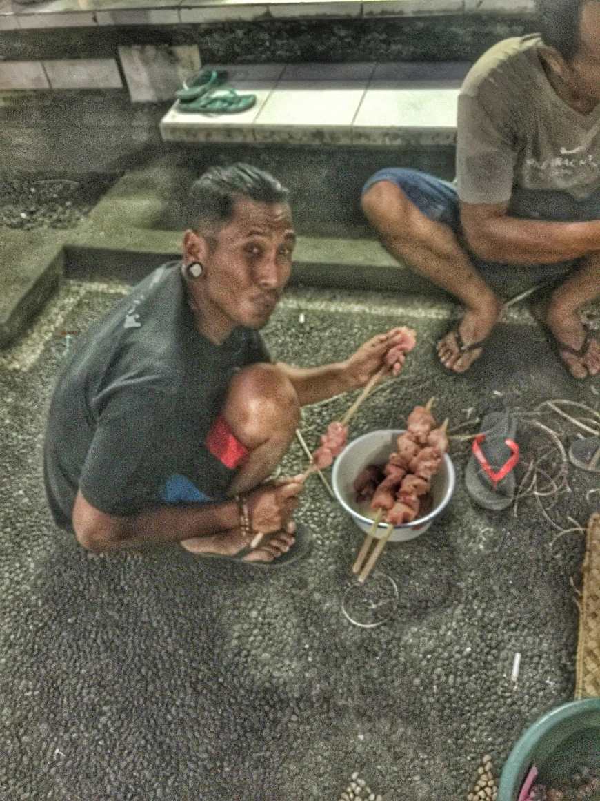 Remy preparing the Sate before it gets cooked