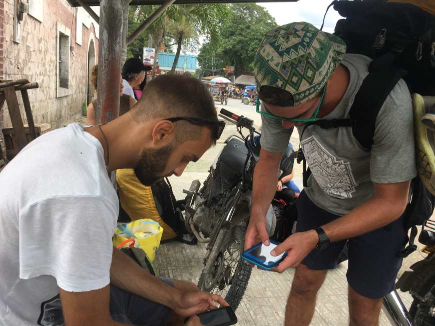 Sorting out directions and bus options with fellow travel friends