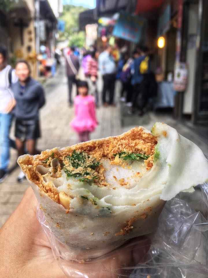 Penut, cilantro, and sorbet wrapped springroll dessert