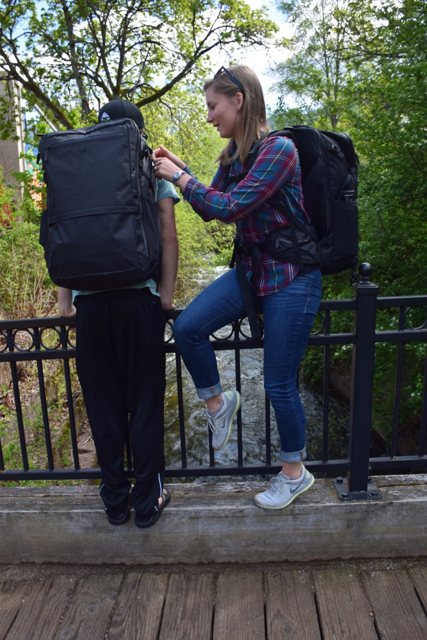 zipping up TJs carry-on sized tortuga backpack as we set off to explore