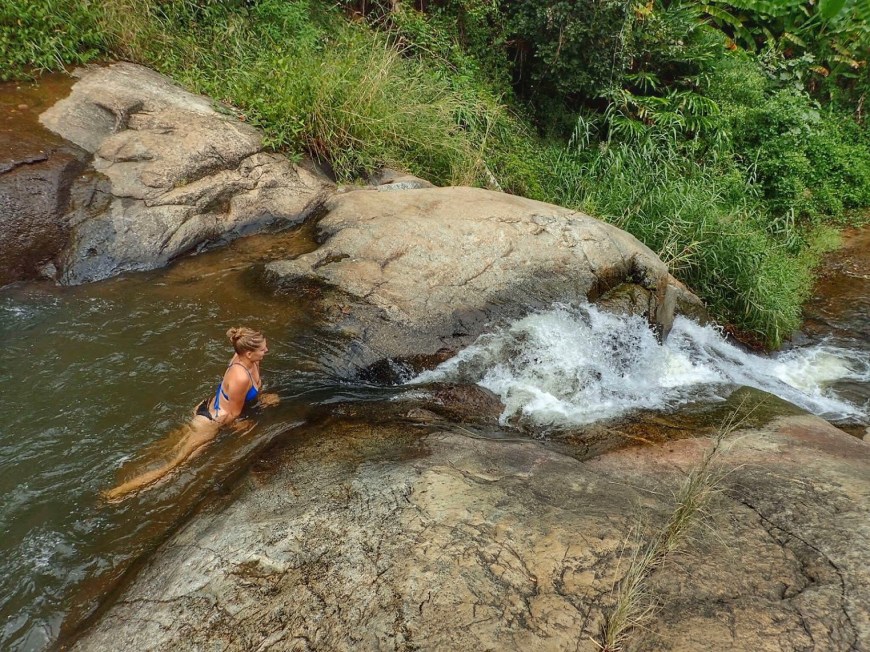 Enjoying the pools between two waterfalls in Pai, Thailand