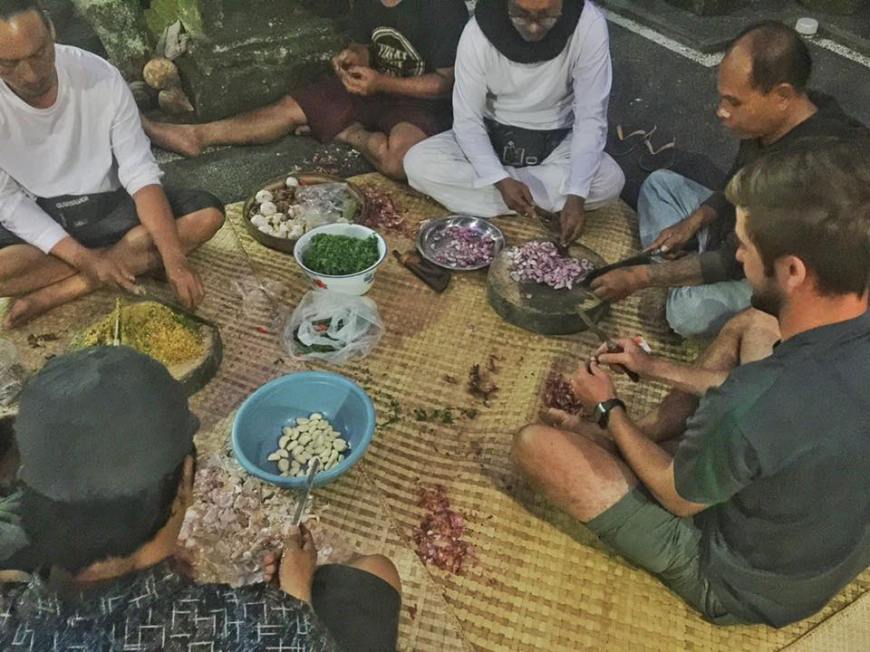 Learning how to prepare Balinese food from a group of locals