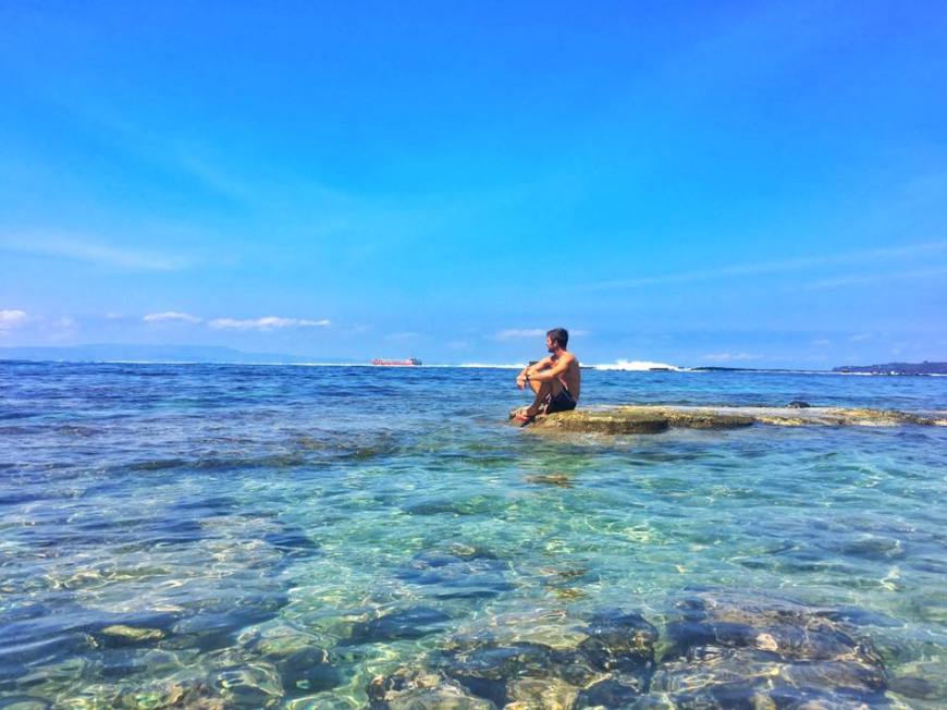 Enjoying the view outside of Candidasa Backpackers at Crystal Beach, Bali
