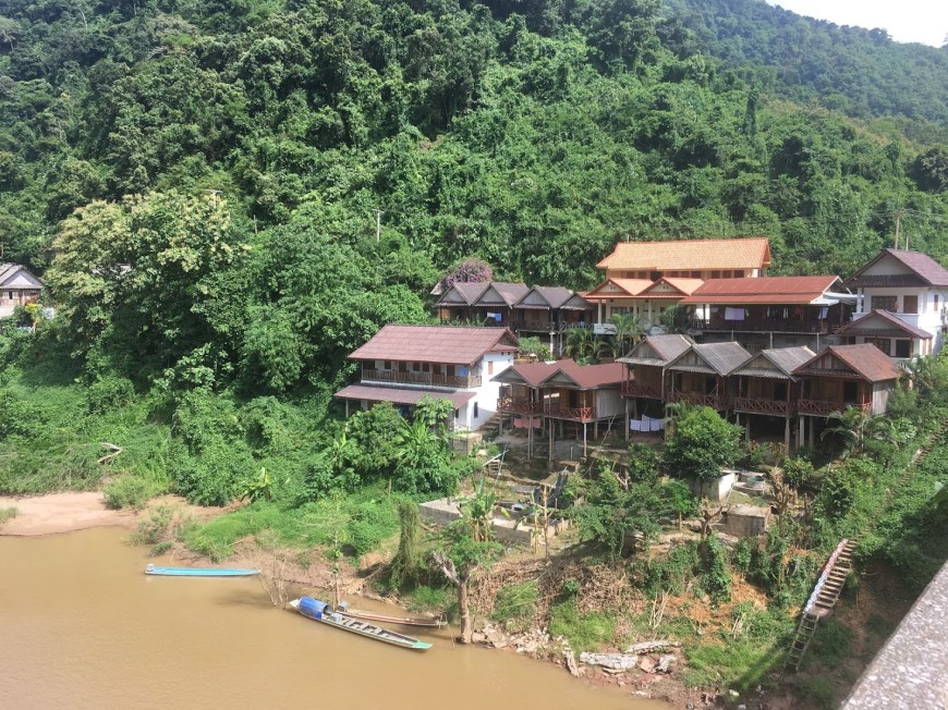 Guest houses line the hillside above the river in Nong Khiaw, Laos